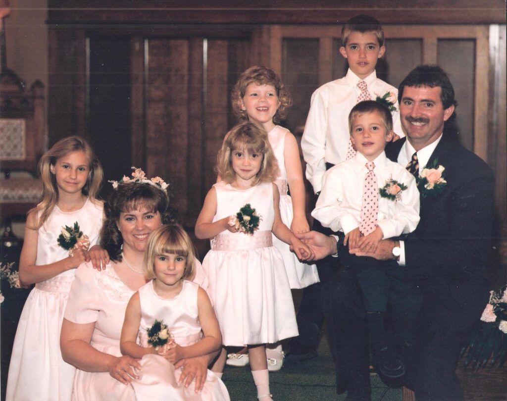 Larry marries Denise, a young widow with two children.